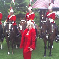 Dee Dee Hanson and Horses On The Background