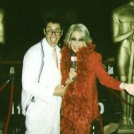 Dee Dee Hanson and a Man At an Oscar's Theme Party